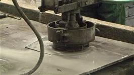 A slate grinder at the Honister Slate Mine